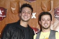 Stephen Barker Liles (L); Eric Gunderson of Love & Theft arrives at the American Country Awards 2011