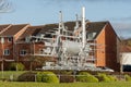 Stephenson's Rocket sculpture on a roundabout in the centre of Killingworth, North Tyneside, UK