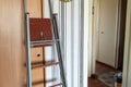 a stepladder leaning against the wall Royalty Free Stock Photo