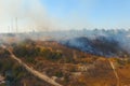 Steppe fire. Burning dry grass, fire smoke Royalty Free Stock Photo