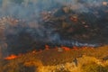 Steppe fire. Burning dry grass, fire smoke Royalty Free Stock Photo