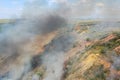 Steppe fire. Burning dry grass, fire smoke Royalty Free Stock Photo