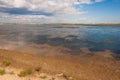 Steppe lake, landscape with clouds