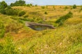 Steppe landscape with drying pond