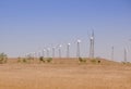 Onshore wind farm, using several horizontal axis turbines, summer day Royalty Free Stock Photo