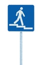 Stepped access entrance to pedestrian underpass subway road sign, man walking downstairs on stairs signage, blue pole post Royalty Free Stock Photo