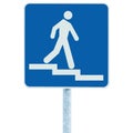 Stepped access entrance to pedestrian underpass subway road sign, man walking downstairs on stairs signage, blue pole post Royalty Free Stock Photo