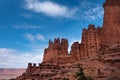 Stepped red rock formation against the beautiful blue sky of Fisher Towers in Moab Utah