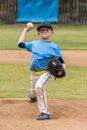 Stepping and throwing the ball hard. Royalty Free Stock Photo