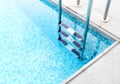 Steps into blue pool Royalty Free Stock Photo