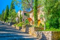 365 steps of Carrer del Calvari stairway leading to the El Calvari chapel at Pollenca, Mallorca, Spain Royalty Free Stock Photo