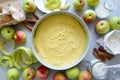 Steps of cooking apple pie. Fresh harvest apples, cinnamon, flour, sugar, butter, eggs, milk and baking mold Royalty Free Stock Photo