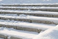 Steps covered in snow in city park Royalty Free Stock Photo