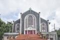 Steps and facade of christian church with stone walls. Entrance to a chapel in Roseau, Dominica