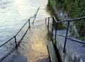 Steps into flood