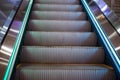 Steps of a gray escalator without people Royalty Free Stock Photo