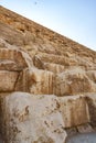 Steps of the Great Pyramid reveal ancient construction techniques and history during the day at Giza Royalty Free Stock Photo