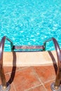 A Steps ladder to pool by the sea nature background. For bathing turquoise water