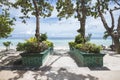 Steps with landscaping leading down to the beach. At Dumaluan Beach in Panglao Island, Bohol, Philippines