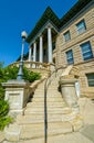 Steps lead to the entrance to the Cascade County Courthouse in Great Falls, Montana, USA - August 18, 2013