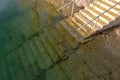 Steps leading down into the water Royalty Free Stock Photo