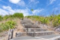 Steps leading to top of hill and lookout over The Lakes residential suburb Royalty Free Stock Photo