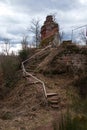 Steps leading up to small German castle ruin on cloudy day Royalty Free Stock Photo