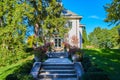 Steps lined with flowers leading to 19th Century American mansion Royalty Free Stock Photo