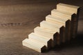 Steps made with blocks on table. Career ladder