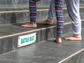 steps of a mosque which read & x22;Batas Suci& x22; in Indonesian, as a warning not to wear footwear. Royalty Free Stock Photo