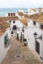 Steps in narrow street with view over the ocean in the old town of Altea, Costa Blanca, Spain Royalty Free Stock Photo