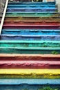 Steps of old street stairway painted with different colors Royalty Free Stock Photo