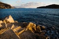 Steps from the port of Dubrovnik into the ocean with view on Lokrum island and coast, Croatia Royalty Free Stock Photo