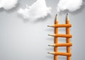 Steps to success, creative concept, pencil ladder with clouds and copy space Royalty Free Stock Photo