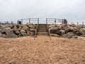 Steps up off the quite sandy beach in the winter