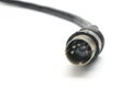 Stereo analog cable with DIN plug on white background