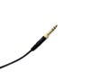 Stereo audio headphone jack with cable on white background.