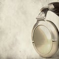 Stereo headphones over grunge background Royalty Free Stock Photo