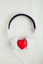 Stereo headphones with red heart symbol