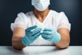 Sterile care doctor puts on white gloves, maintaining medical hygiene