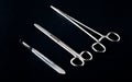 Sterile instruments on a black background close-up. Preparing instruments for surgery Royalty Free Stock Photo