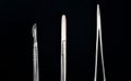 Sterile instruments on a black background close-up. Preparing instruments for surgery Royalty Free Stock Photo