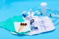 Sterile Urinary Drainage Bag with Anti-Reflux Tower, green vinyl sterile gloves and Povidone Iodine Swabsticks Royalty Free Stock Photo