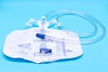 Sterile Urinary Drainage Bag with Anti-Reflux Tower isolated on blue background Royalty Free Stock Photo