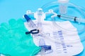 Sterile urinary drainage bag, 10 ml syringe pre-filled with sterile water and specimen container with lid and label. Royalty Free Stock Photo