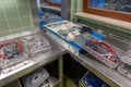 a sterilization department in a hospital are many instrument trays that still need to be packed