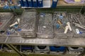 a sterilization department in a hospital are many instrument trays that still need to be packed