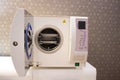 Sterilizing medical instruments in autoclave. Equipment for sterile cleaning of working medical instruments.