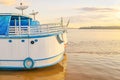 Stern of the boats on the banks of the Rio Madeira river on a sunset