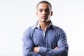 Stern businessman in blue shirt portrait